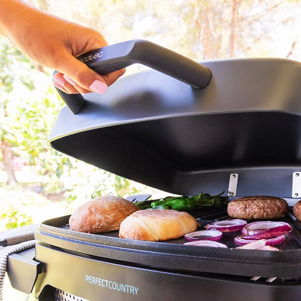 Cecotec Grill elektryczny Perfect Country 2000 EasyMove 2000 W, powierzchnia mieszana i nieprzywierająca, pokrywa na zawiasach, regulowany termostat, taca tłuszczowa, stalowe nogi i kółka.
