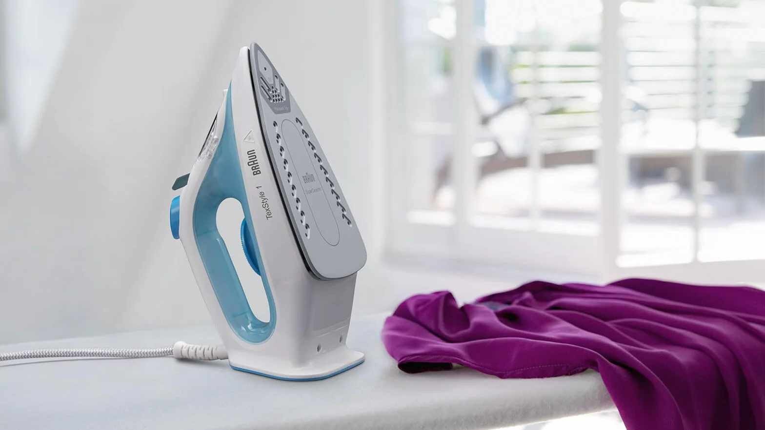 Braun TexStyle 1 SI 1050BL żelazko parowe z stopą żelazka SuperCeramic, pionowa para, 2000 W, niebieskie