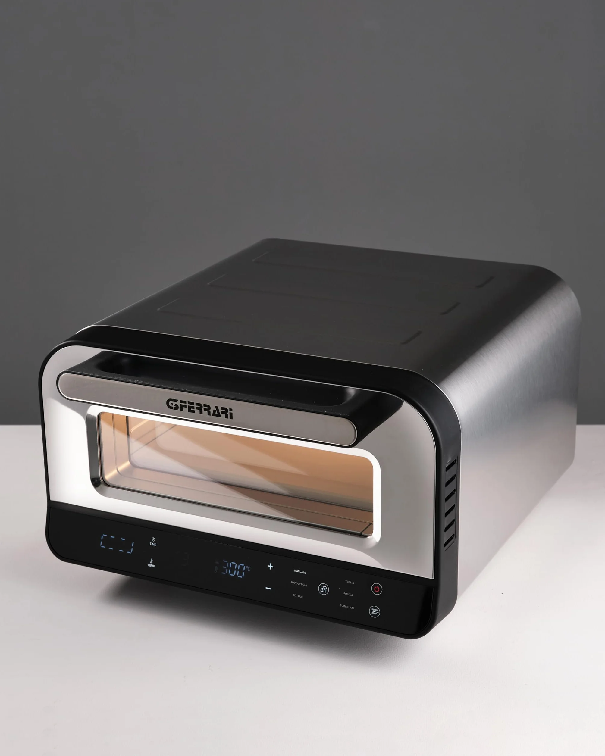 G3 Ferrari G10204 Pizza Pro 2 minuty, 1700 W, osiąga do 450°C, zimne ściany, gotowanie w 2 minuty, cyfrowy wyświetlacz z 6 programami, kamień ogniotrwały, akcesoria i książka kucharska w zestawie,